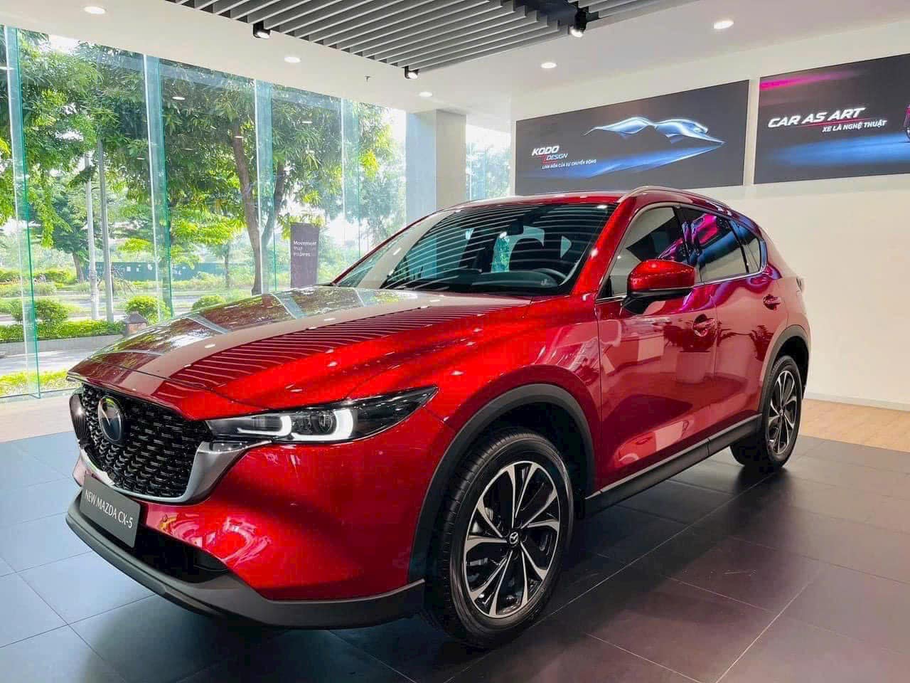 829 triệu mua Peugeot 2008 hay Mazda CX-5: Chọn cá tính hay rộng hơn, mạnh hơn, loa hay hơn?- Ảnh 2. 829 triệu mua Peugeot 2008 hay Mazda CX-5: Chọn cá tính hay rộng hơn, mạnh hơn, loa hay hơn?- Ảnh 2.