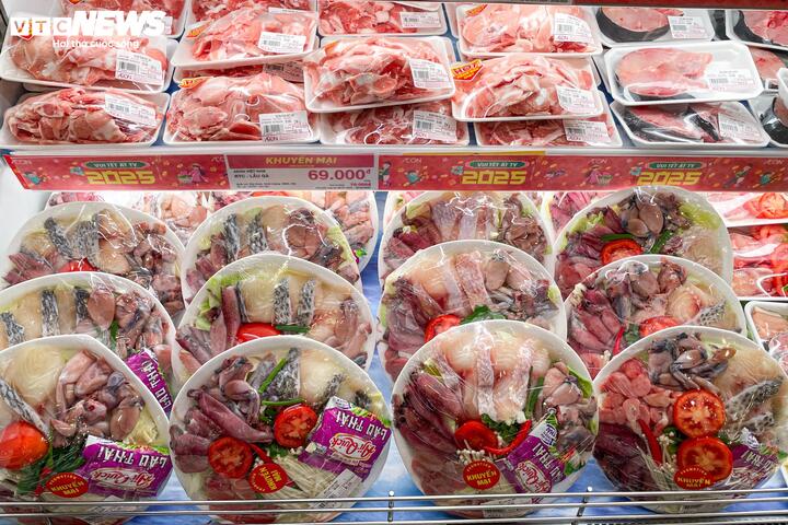 Siêu thị lại đầy ắp hàng hóa sau kỳ nghỉ Tết Nguyên đán Ất Tỵ- Ảnh 7.