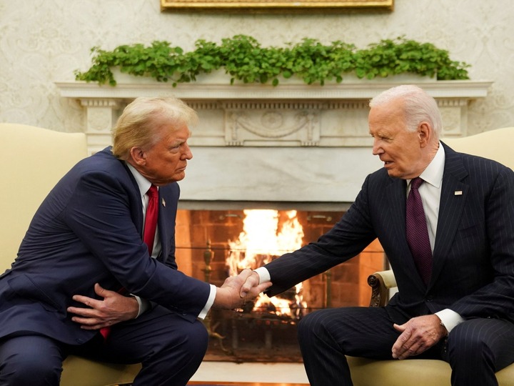 Ông Trump tuyên bố 'sa thải', tước quyền tiếp cận tin mật của ông Biden- Ảnh 1.