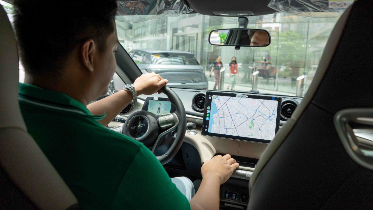 Cái bắt tay giữa Grab và hãng xe điện số 1 thế giới: Cam kết thu nhập 25 triệu đồng/kỳ cho tài xế- Ảnh 1. Cái bắt tay giữa Grab và hãng xe điện số 1 thế giới: Cam kết thu nhập 25 triệu đồng/kỳ cho tài xế- Ảnh 1.