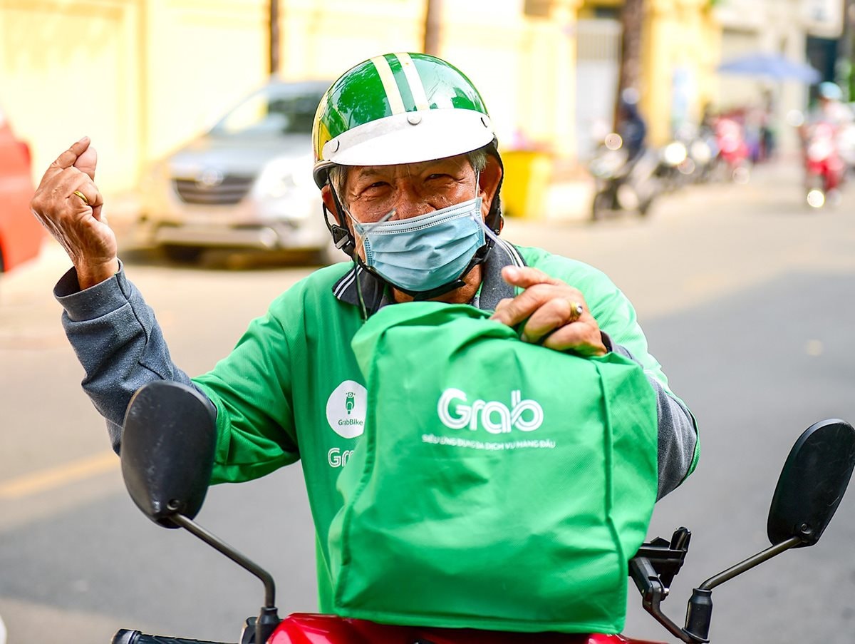Grab có giải pháp mới cho người dùng đặt món một mình- Ảnh 1.