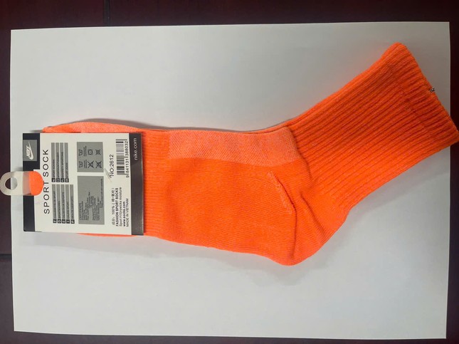 Khởi tố đối tượng sản xuất 200.000 đôi tất giả Nike, Adidas- Ảnh 3. Khởi tố đối tượng sản xuất 200.000 đôi tất giả Nike, Adidas- Ảnh 3.