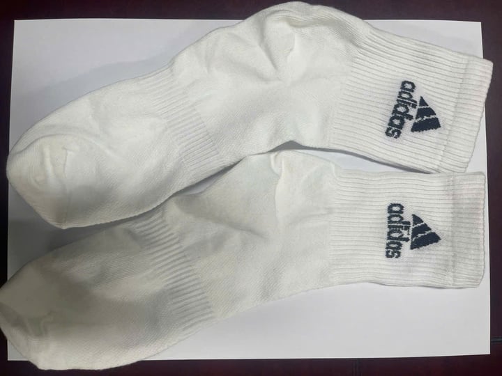 Khởi tố chủ cơ sở sản xuất 200.000 đôi tất giả nhãn hiệu Nike, Adidas, Uniqlo- Ảnh 3. Khởi tố chủ cơ sở sản xuất 200.000 đôi tất giả nhãn hiệu Nike, Adidas, Uniqlo- Ảnh 3.