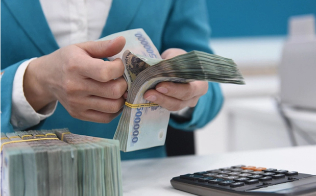 Mức lương mới của chuyên gia cao nhất 70 triệu đồng/tháng- Ảnh 1.