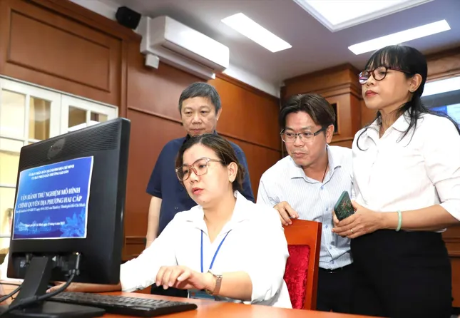 Ngày đầu chạy thử xã, phường mới- Ảnh 1. Ngày đầu chạy thử xã, phường mới- Ảnh 1.