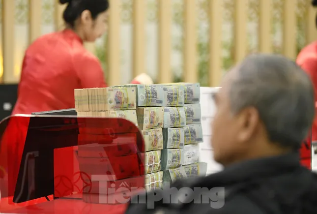 Cảnh báo rủi ro khi lượng tiền khổng lồ 'bơm' ra nền kinh tế- Ảnh 1. Cảnh báo rủi ro khi lượng tiền khổng lồ 'bơm' ra nền kinh tế- Ảnh 1.