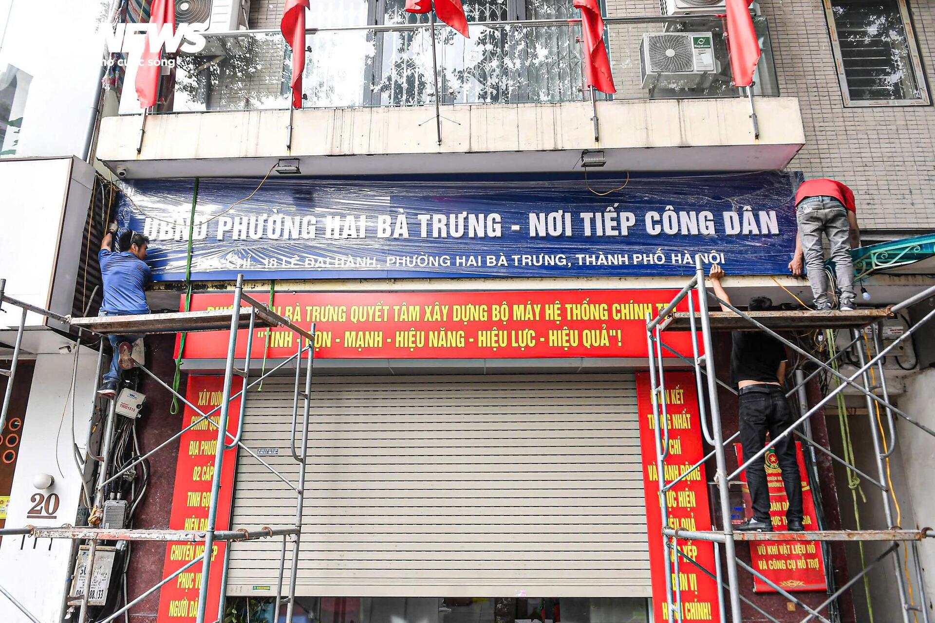 Hà Nội thay biển trụ sở phường mới, sẵn sàng vận hành chính quyền 2 cấp từ 1/7- Ảnh 2. Hà Nội thay biển trụ sở phường mới, sẵn sàng vận hành chính quyền 2 cấp từ 1/7- Ảnh 2.