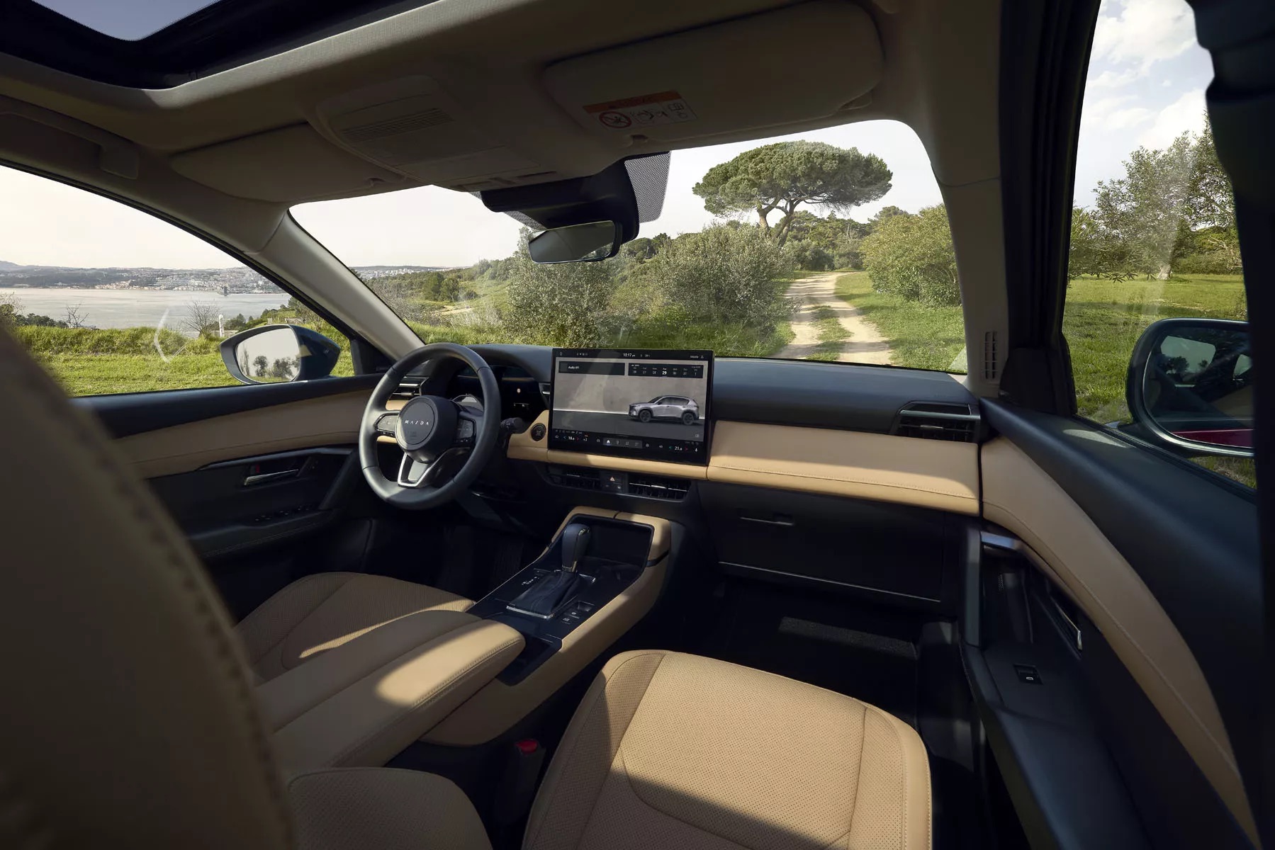 Mazda CX-5 2025 ra mắt: Nội thất mới hoàn toàn, màn hình lớn, ít phím bấm, 'úp mở' bản hybrid gây bất ngờ- Ảnh 3. Mazda CX-5 2025 ra mắt: Nội thất mới hoàn toàn, màn hình lớn, ít phím bấm, 'úp mở' bản hybrid gây bất ngờ- Ảnh 3.