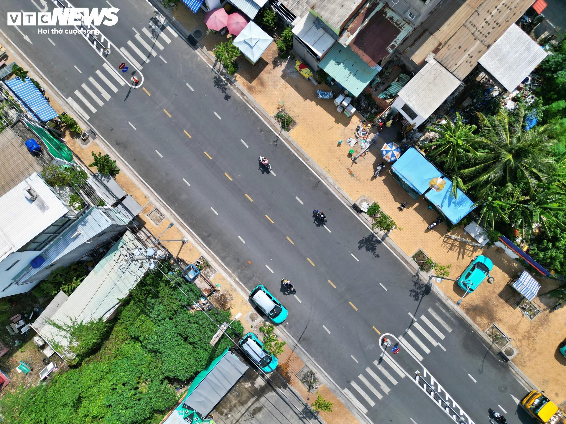 Rạch chống ngập thành đường sau 4 năm cải tạo ở TP.HCM- Ảnh 9. Rạch chống ngập thành đường sau 4 năm cải tạo ở TP.HCM- Ảnh 9.