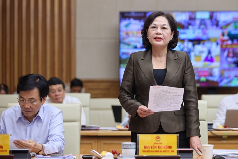Họp với Thủ tướng, Thống đốc Nguyễn Thị Hồng nói gì về định hướng điều hành lãi suất và tỷ giá trong thời gian tới?- Ảnh 1. Họp với Thủ tướng, Thống đốc Nguyễn Thị Hồng nói gì về định hướng điều hành lãi suất và tỷ giá trong thời gian tới?- Ảnh 1.