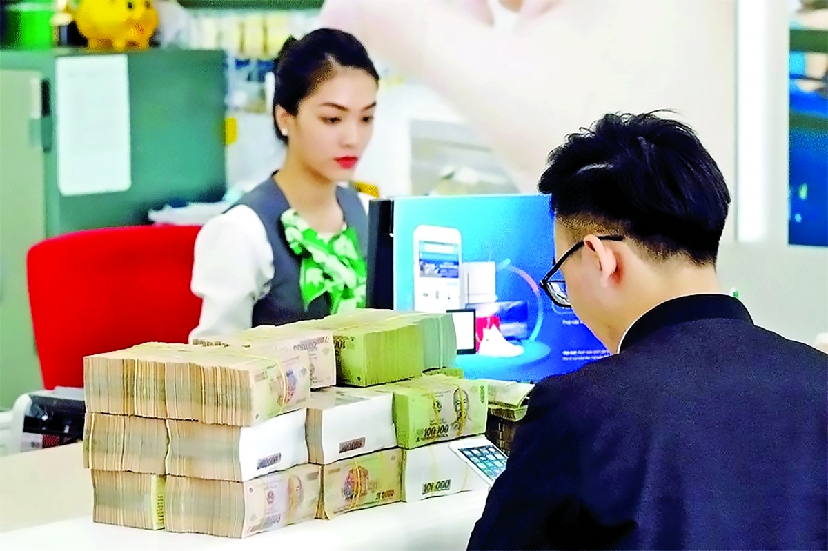 Dòng tín dụng đang chảy mạnh vào khu vực kinh tế tư nhân- Ảnh 1.
