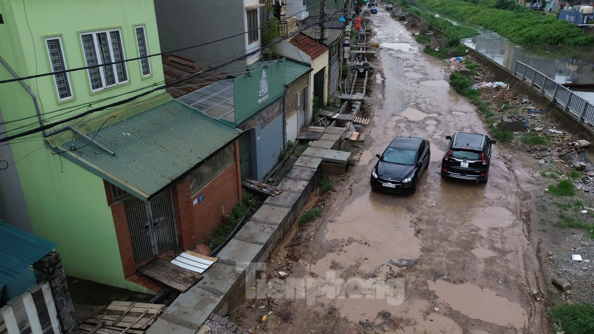 Thiết kế nền đường mới cao hơn gần 1m, cả trăm hộ dân bất an- Ảnh 9. Thiết kế nền đường mới cao hơn gần 1m, cả trăm hộ dân bất an- Ảnh 9.