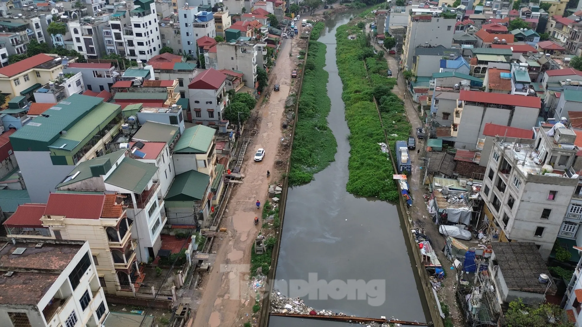 Thiết kế nền đường mới cao hơn gần 1m, cả trăm hộ dân bất an- Ảnh 1. Thiết kế nền đường mới cao hơn gần 1m, cả trăm hộ dân bất an- Ảnh 1.