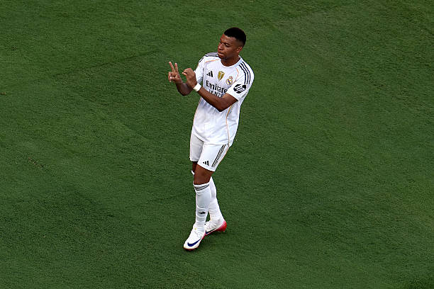 Mbappe ăn mừng đầy xúc động tưởng nhớ Diogo Jota khi lập siêu phẩm giúp Real thắng nghẹt thở Dortmund ở FIFA Club World Cup- Ảnh 2. Mbappe ăn mừng đầy xúc động tưởng nhớ Diogo Jota khi lập siêu phẩm giúp Real thắng nghẹt thở Dortmund ở FIFA Club World Cup- Ảnh 2.