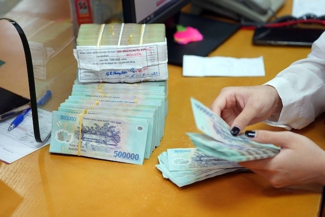 Ngân hàng 'bơm' mạnh vốn ra nền kinh tế- Ảnh 1.