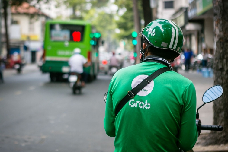 Giám đốc đối ngoại Grab: Nhận hỗ trợ từ Nhà nước để xây trạm sạc thì phải cho phép nhiều hãng xe dùng chung- Ảnh 1.