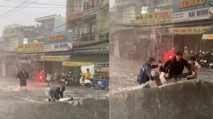 'Sốt' clip 3 thanh niên lao ra cứu chiếc xe máy bị mưa lớn cuốn trôi ở TP.HCM- Ảnh 1. 'Sốt' clip 3 thanh niên lao ra cứu chiếc xe máy bị mưa lớn cuốn trôi ở TP.HCM- Ảnh 1.