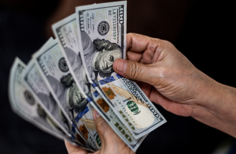 Dự báo về tiền Việt khi giá USD liên tục trồi sụt- Ảnh 1. Dự báo về tiền Việt khi giá USD liên tục trồi sụt- Ảnh 1.