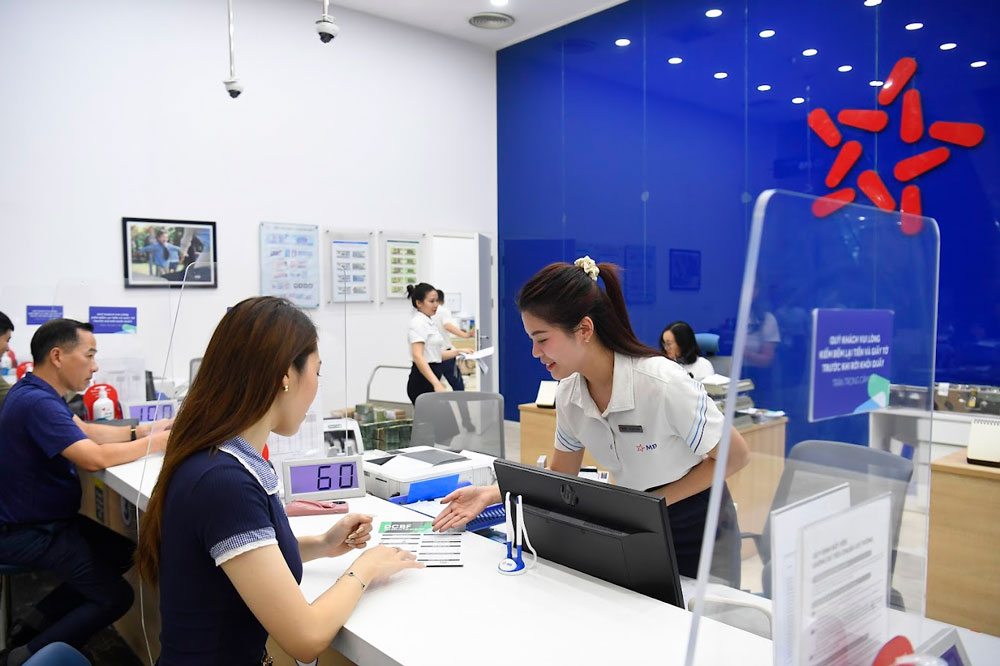 Tiếp tục bơm vốn ra nền kinh tế- Ảnh 1. Tiếp tục bơm vốn ra nền kinh tế- Ảnh 1.