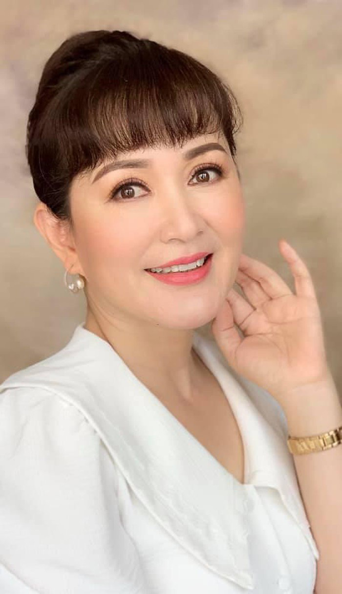 Nữ hoàng ảnh lịch đẹp nhất miền Bắc, nhan sắc thế nào mà từng được coi là "bùa may mắn"?- Ảnh 5.