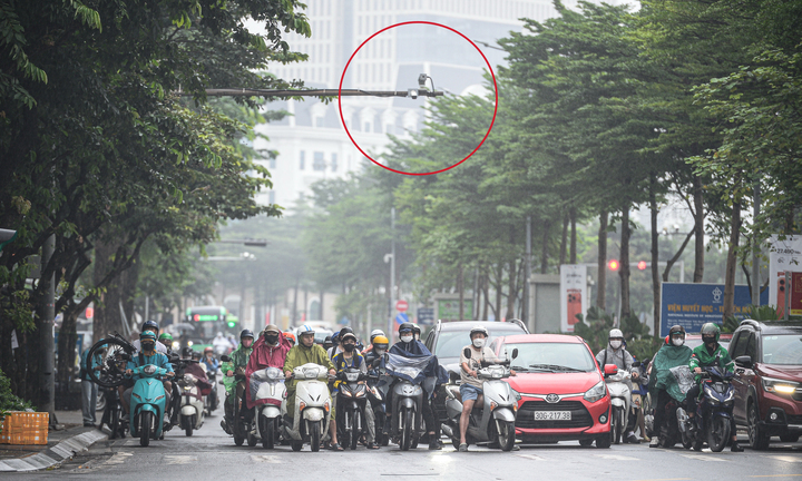 Camera AI có thể nhận diện và ra cảnh báo dù tài xế cố tình dán, che biển số- Ảnh 1.