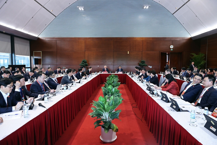 Thảo luận tại Đại hội XIV, Thủ tướng Phạm Minh Chính nhấn mạnh quyết tâm tăng trưởng hai con số- Ảnh 1.