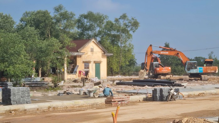 Chạy nước rút trên công trường tái định cư- Ảnh 1.