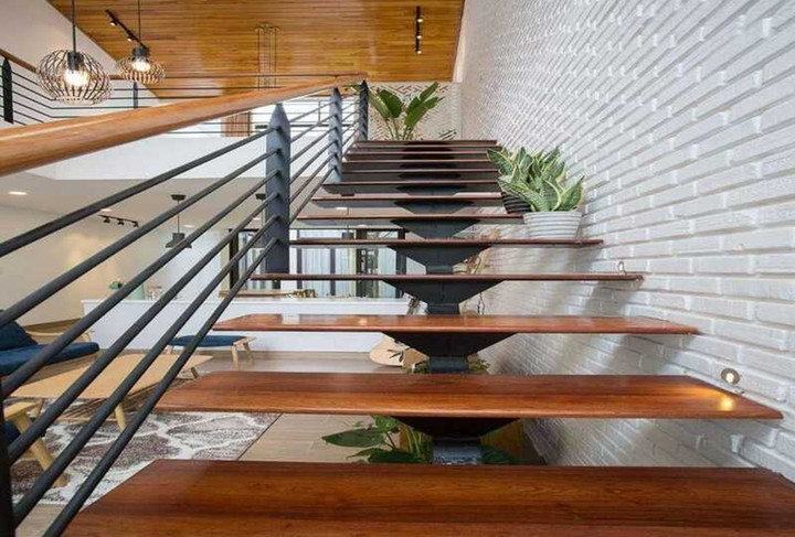 Các mẫu cầu thang xương cá độc đáo cho nhà phố- Ảnh 3.