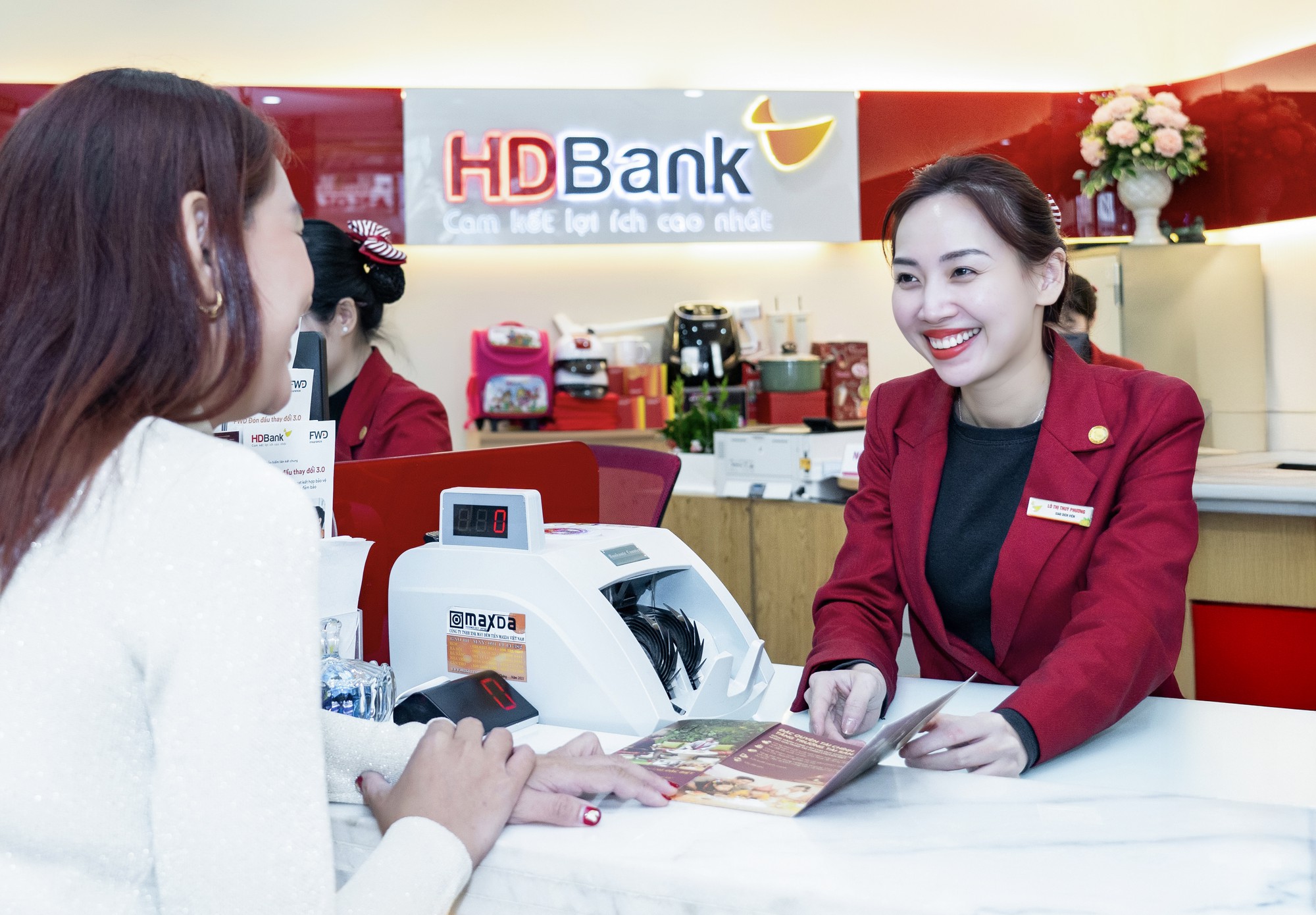 HDBank triển khai gói tín dụng 10.000 tỷ đồng, giảm lãi suất 1,5%/năm hỗ trợ doanh nghiệp - Ảnh 1.