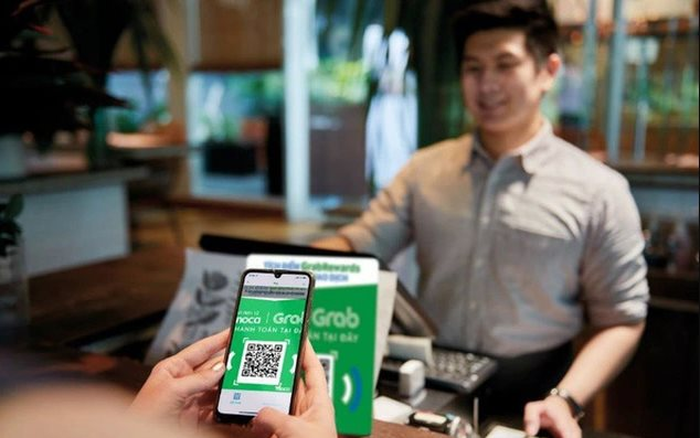 Rũ bỏ áo ‘giao cơm’, Grab chi nửa tỷ USD để làm Fintech, dịch vụ tài chính tăng nhanh hơn mảng gọi đồ ăn- Ảnh 1.