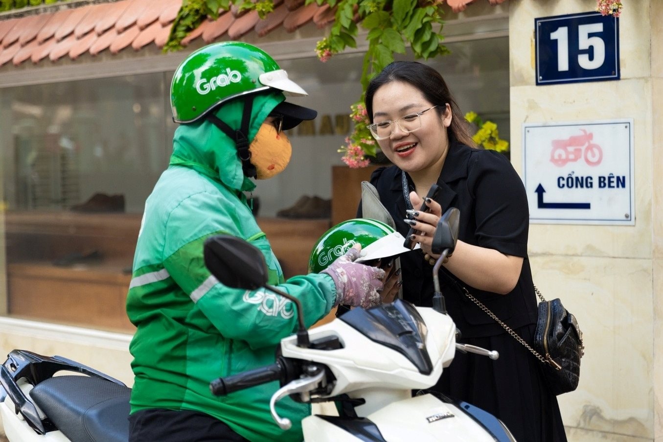 Grab duy trì vị thế dẫn đầu tổng thể trong sự cạnh tranh khốc liệt của thị trường gọi xe- Ảnh 1.