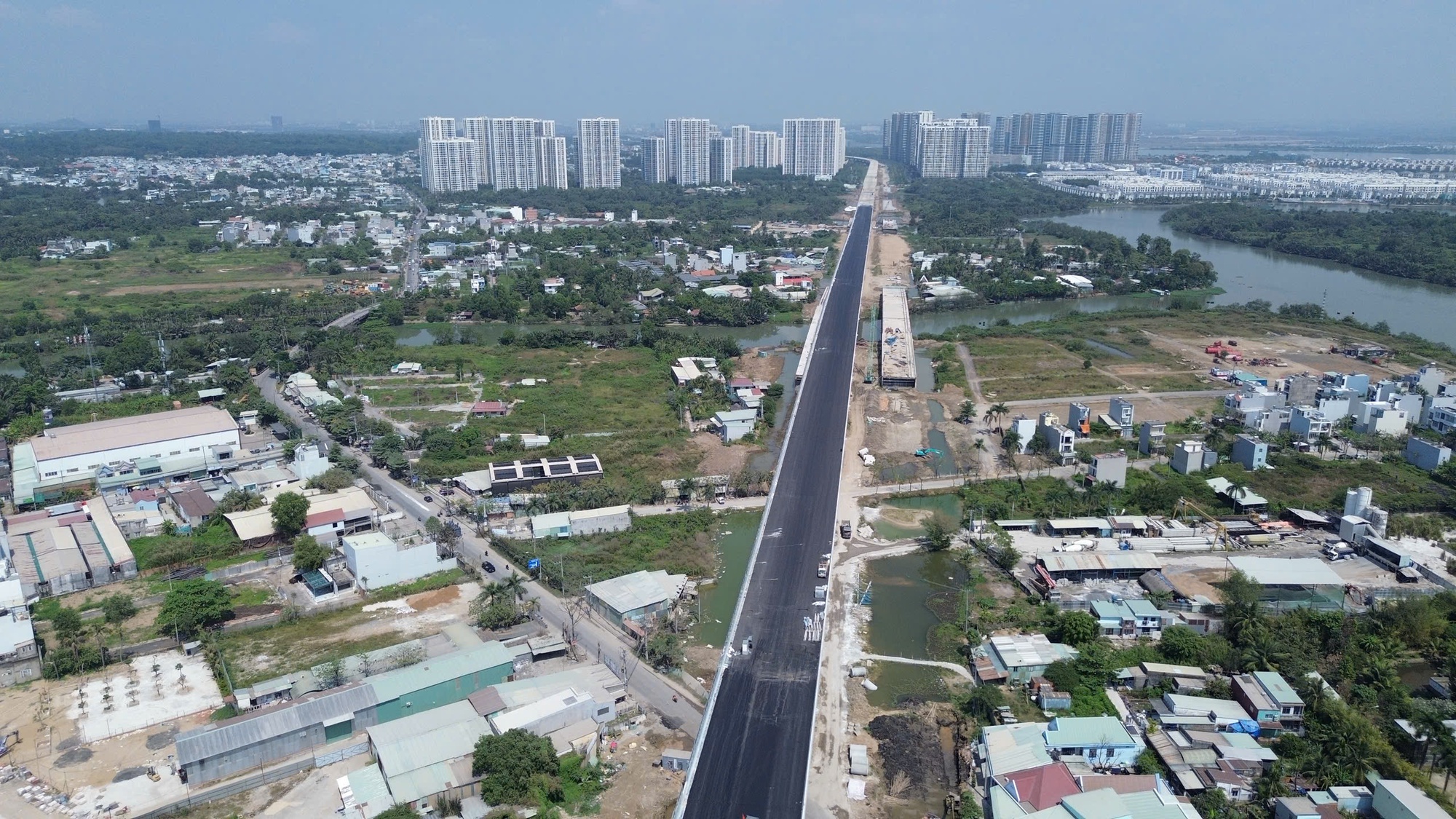 Xuân về trên công trường đường Vành đai 3 TPHCM - Ảnh 9.