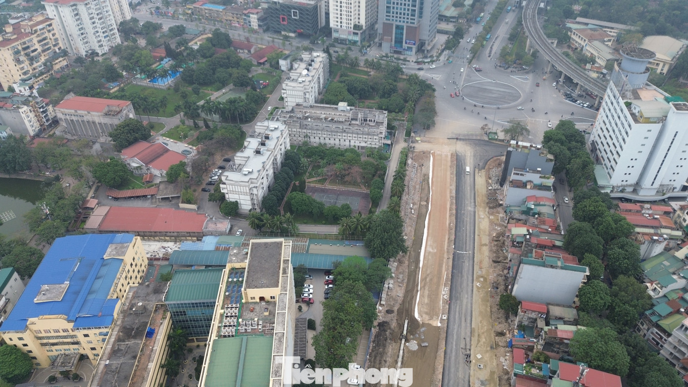 Hà Nội: Công nhân làm việc xuyên Tết trên công trường Vành đai 1- Ảnh 1.