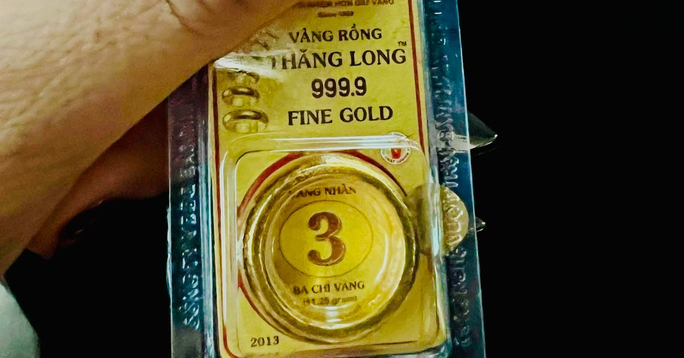 Dùng tiền lì xì Tết mua vàng hay tự do tiêu sài?- Ảnh 1.