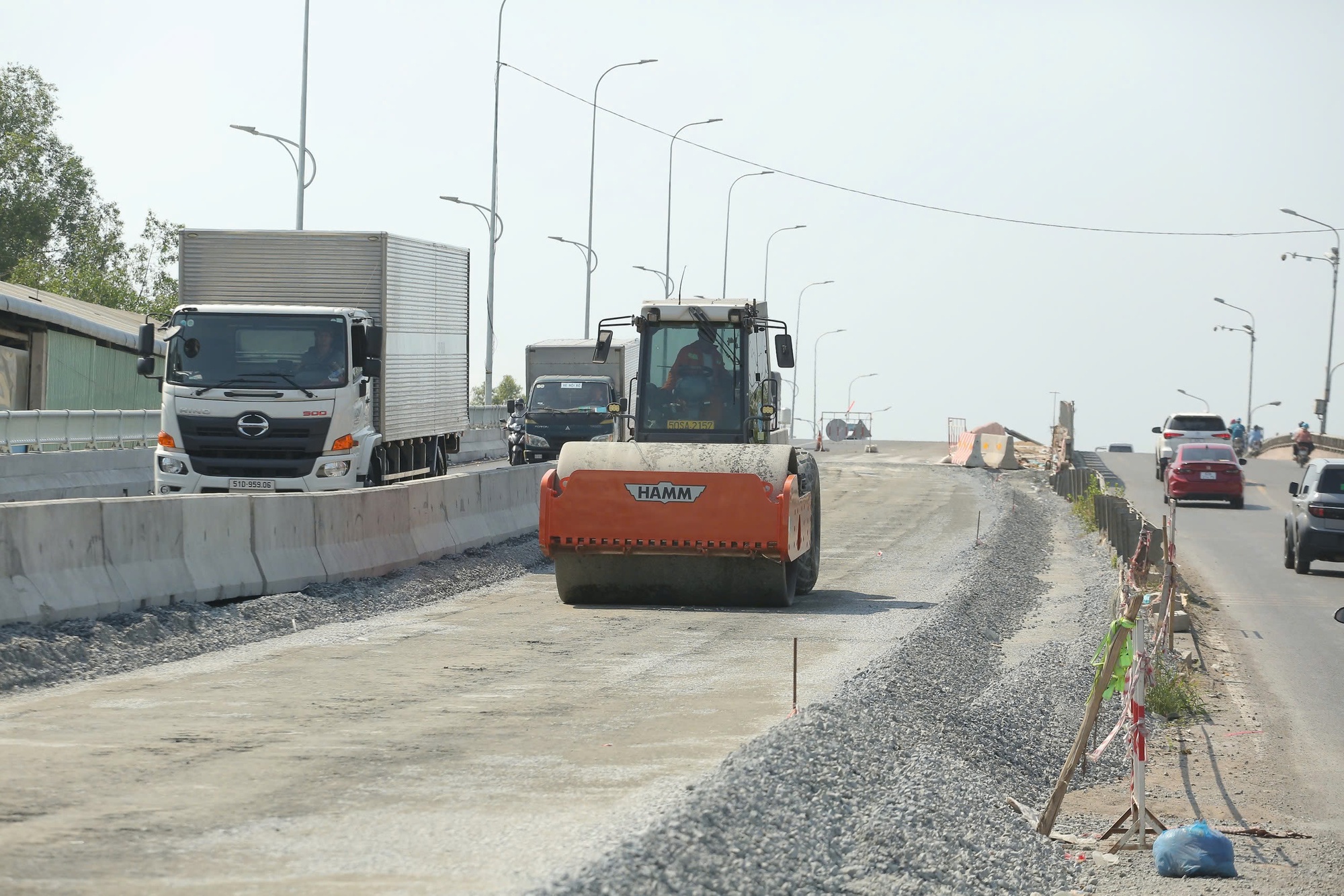 Thông xe tạm cầu Ông Thìn thúc đẩy mở rộng Quốc lộ 50 năm 2026 - Ảnh 9.