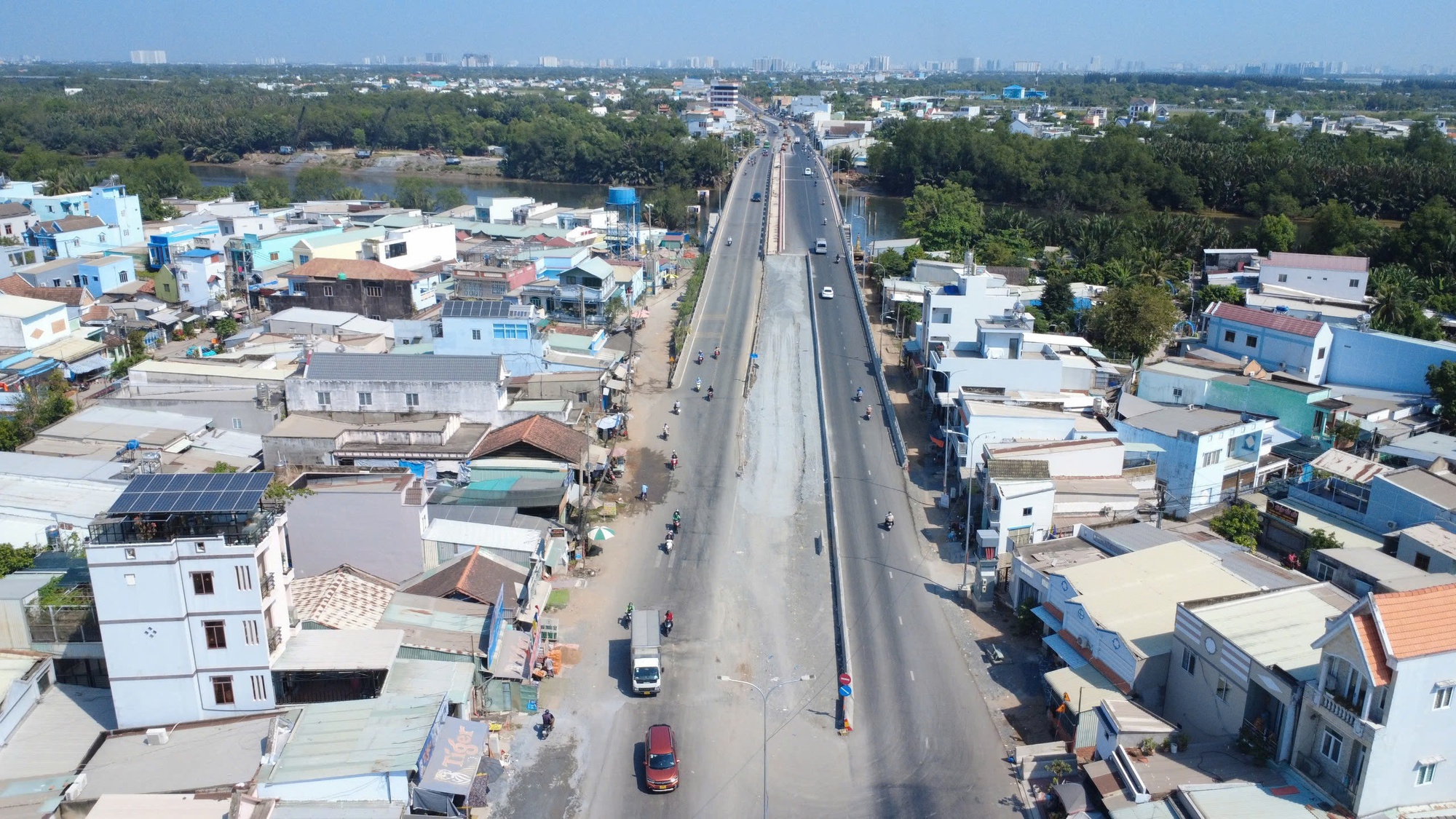 Thông xe tạm cầu Ông Thìn thúc đẩy mở rộng Quốc lộ 50 năm 2026 - Ảnh 10.