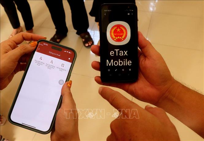 Khoảng 2,3 triệu hộ kinh doanh đã đăng ký eTax Mobile- Ảnh 1.