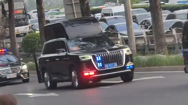 Chiếc SUV bí ẩn với mái khổng lồ trong đoàn xe ông Trump ở Trung Quốc- Ảnh 2.
