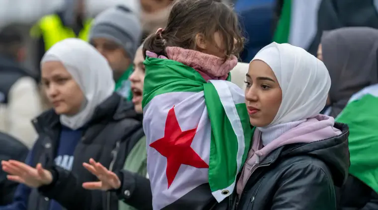 Đức cân nhắc trả tiền cho người di cư Syria tự nguyện hồi hương- Ảnh 2.