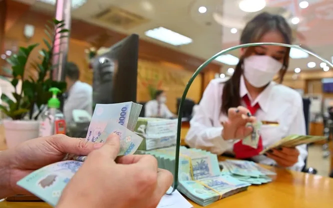Phó Thủ tướng yêu cầu kéo giảm lãi suất cho vay xuống mức thấp nhất có thể- Ảnh 1.