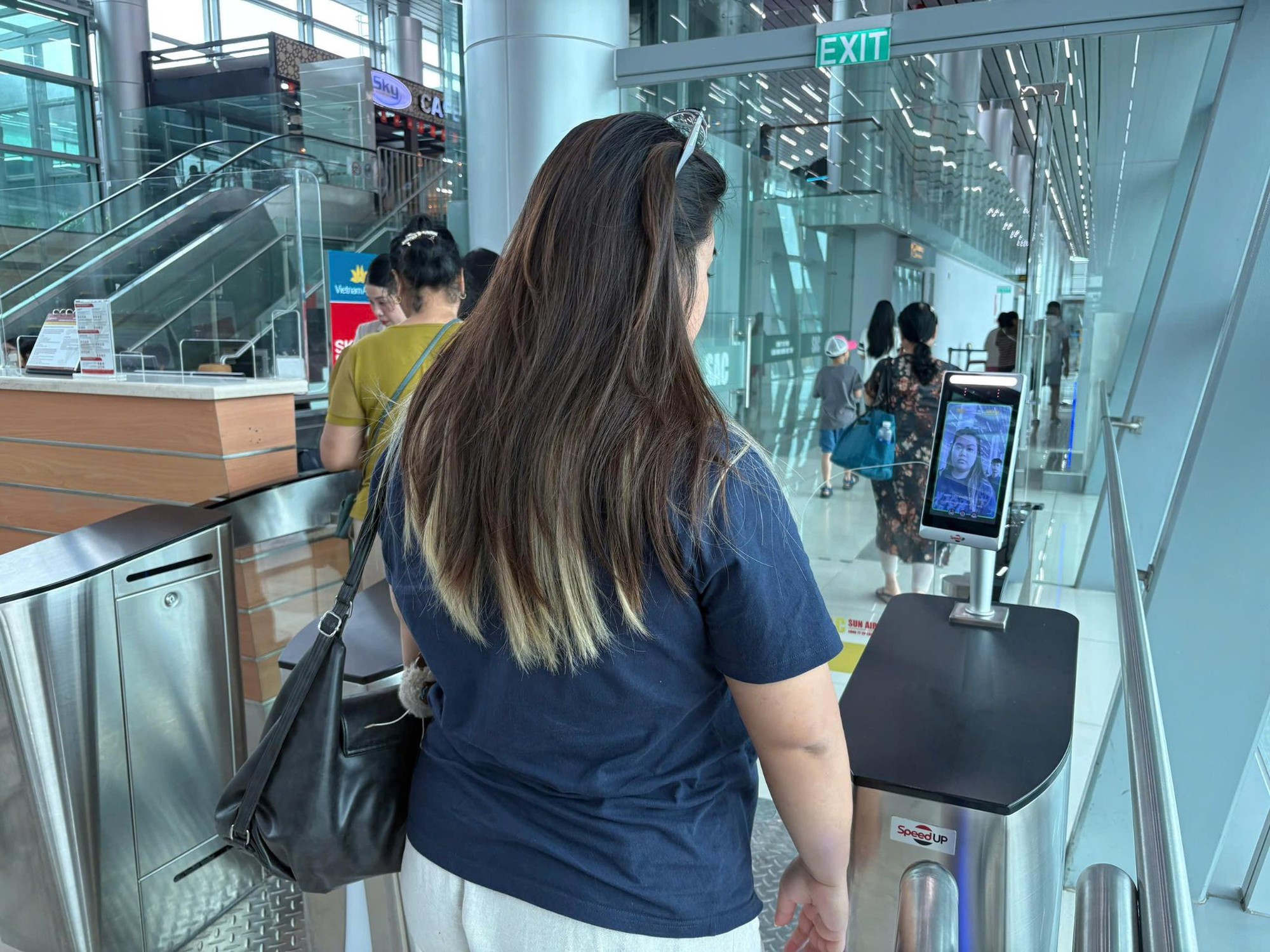 Cảng HKQT Phú Quốc áp dụng toàn trình công nghệ nhận diện khuôn mặt Sun Express - Ảnh 4.