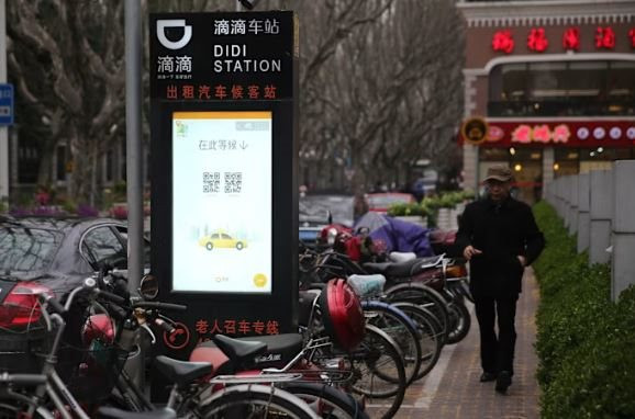 ‘Chén cơm’ của 400.000 tài xế taxi truyền thống tại siêu đô thị lớn bậc nhất châu Á sắp bị đạp đổ, mỗi ngày chỉ được nhận 13 cuốc khách- Ảnh 1.