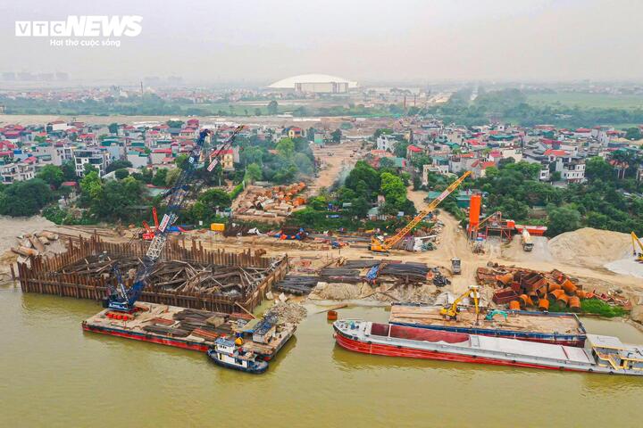 Hình hài đường dẫn cầu Tứ Liên dần hiện rõ bên bờ sông Hồng- Ảnh 17.