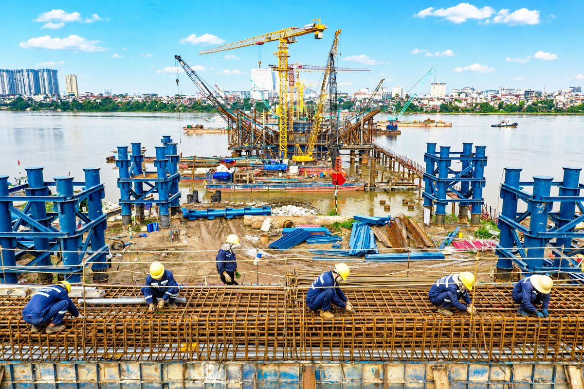 Tăng tốc thi công cầu Trần Hưng Đạo- Ảnh 1.