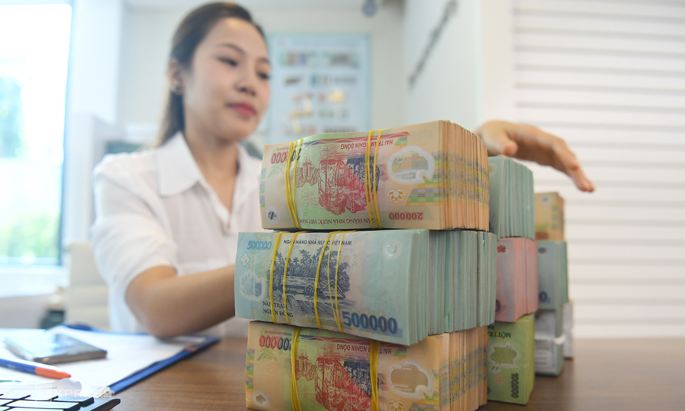 Nguồn vốn rẻ tiếp sức cho doanh nghiệp, tạo đà bứt phá cho tăng trưởng - Ảnh 1.