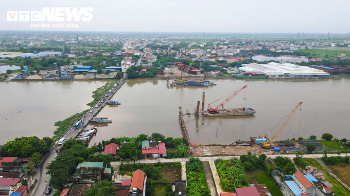 Diện mạo cây cầu vượt sông gần 600 tỷ đồng dần thành hình tại Ninh Bình- Ảnh 1.