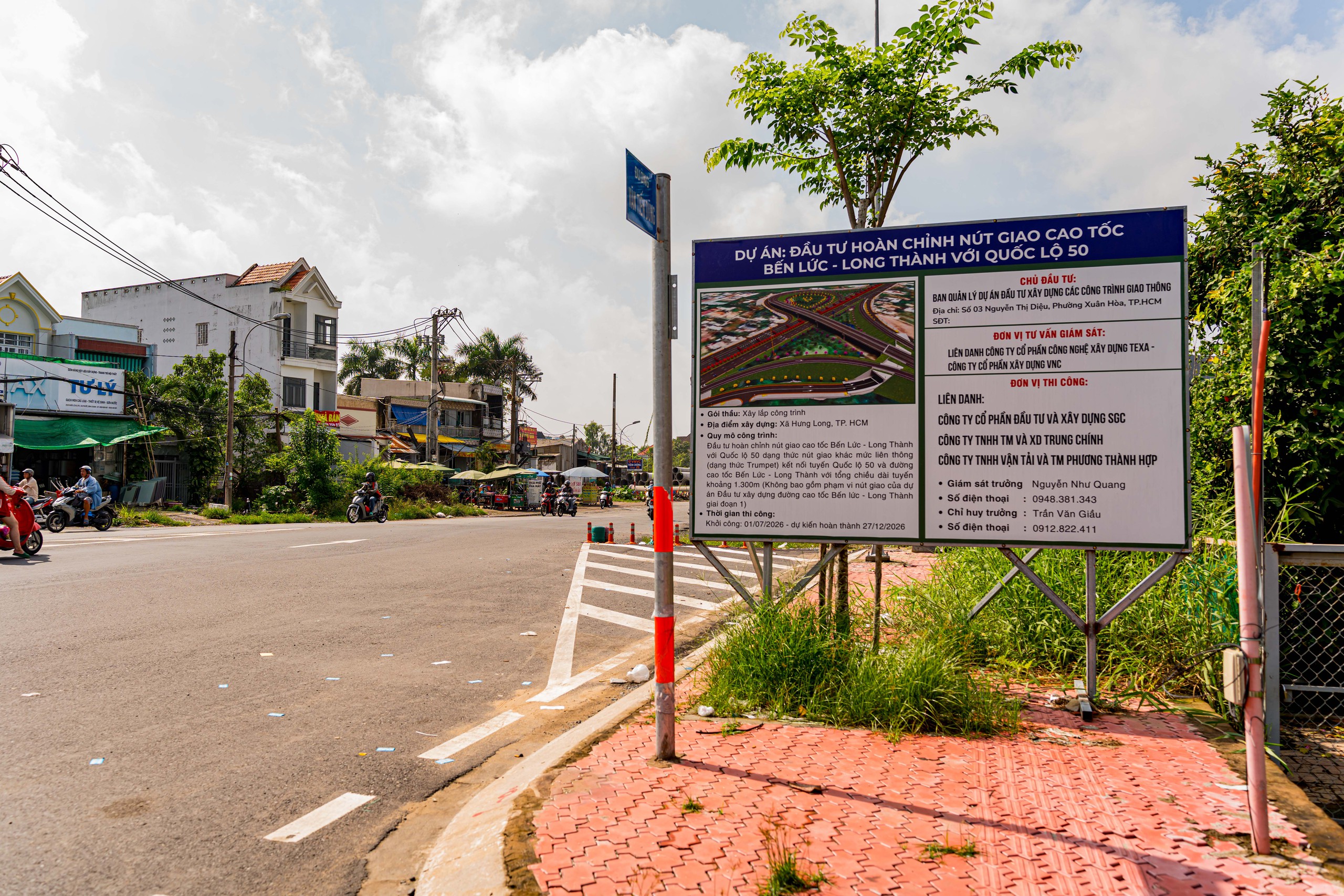 Gỡ xong "nút thắt" 250m, tuyến Quốc lộ 1.500 tỷ cửa ngõ phía Nam lột xác: Đường lớn mở đến đâu, nhà phố đua nhau mọc lên đến đó  - Ảnh 10.