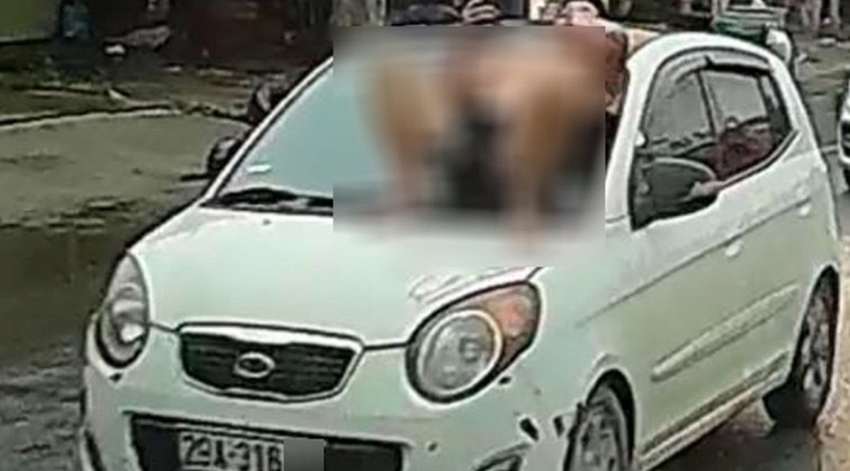 Bất ngờ lý do người đàn ông nằm trên capo ô tô đang chạy giữa phố Hà Nội