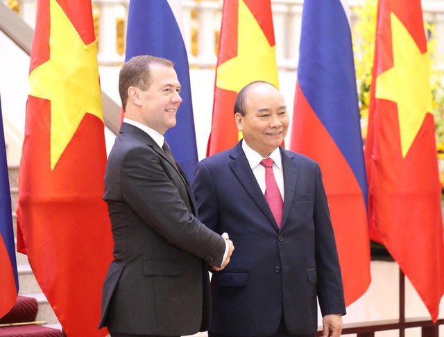 Cận cảnh lễ đón Thủ tướng Nga Dmitry Medvedev tại Phủ Chủ tịch - Ảnh 7.
