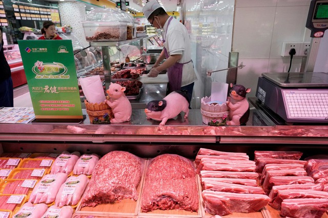 Khủng hoảng thịt lợn, giá tiêu dùng tại Trung Quốc tăng cao nhất 7 năm - Ảnh 1.